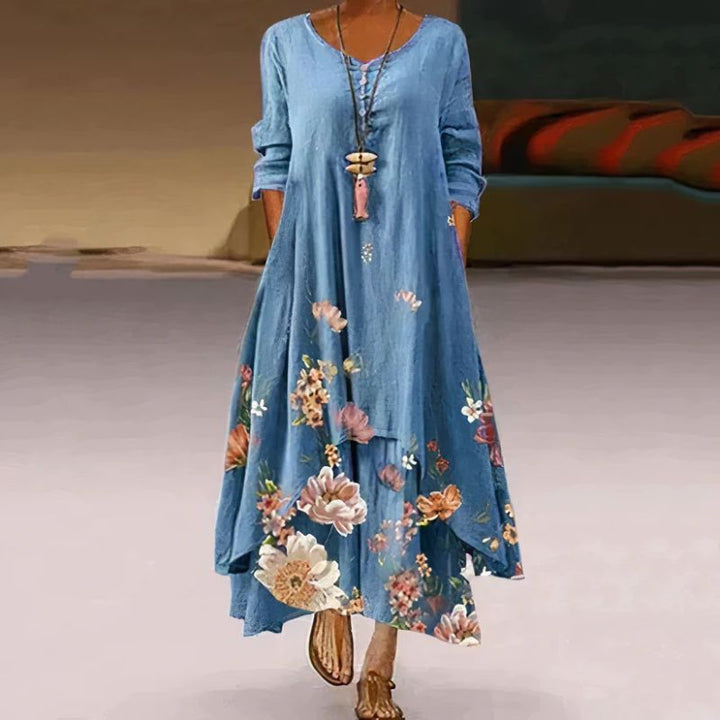 Lange damesjurk met bloemenprint, lange mouwen, vloeiend maxi-ontwerp, vrouwelijk, verkrijgbaar in verschillende kleuren.