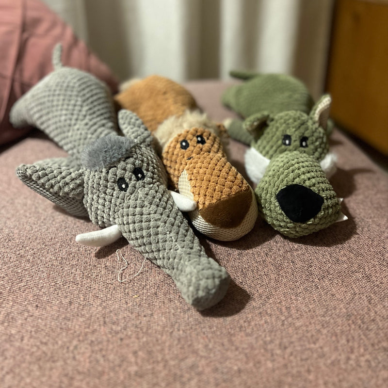 Duurzaam hondenspeelgoed van stof, olifantenontwerp, robuust voor sterke kauwers, bevordert tandverzorging, ideaal voor alle honden.