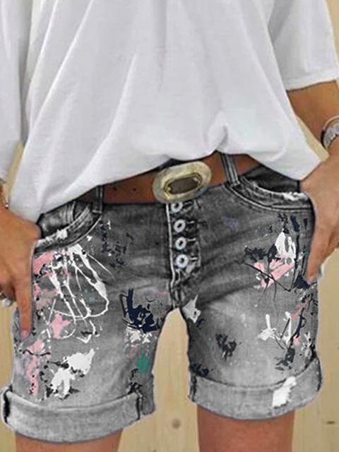 Casual dames denimshorts met uniek multi-knoop patroon, veelzijdig te combineren voor elke gelegenheid.