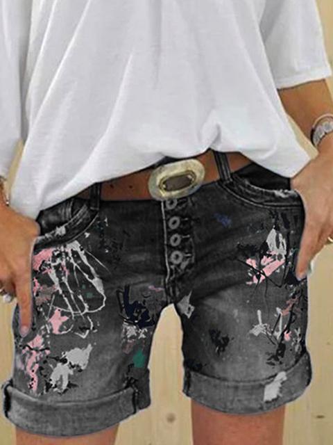Casual dames denimshorts met uniek multi-knoop patroon, veelzijdig te combineren voor elke gelegenheid.