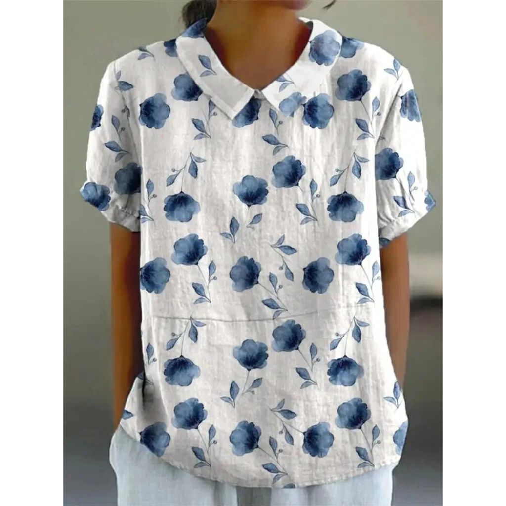 Casual damesblouse met bloemenprint, gemaakt van lichtgewicht katoen, ronde hals en korte mouwen voor zomerse dagen.