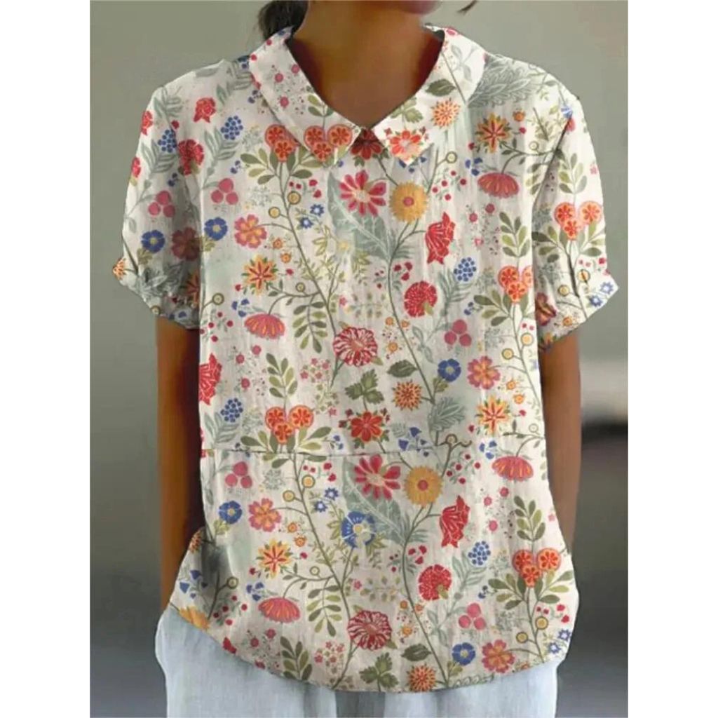 Casual damesblouse met bloemenprint, gemaakt van lichtgewicht katoen, ronde hals en korte mouwen voor zomerse dagen.