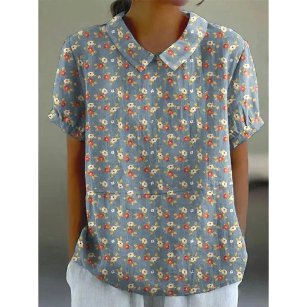 Casual damesblouse met bloemenprint, gemaakt van lichtgewicht katoen, ronde hals en korte mouwen voor zomerse dagen.