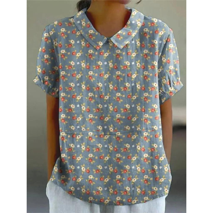 Casual damesblouse met bloemenprint, gemaakt van lichtgewicht katoen, ronde hals en korte mouwen voor zomerse dagen.