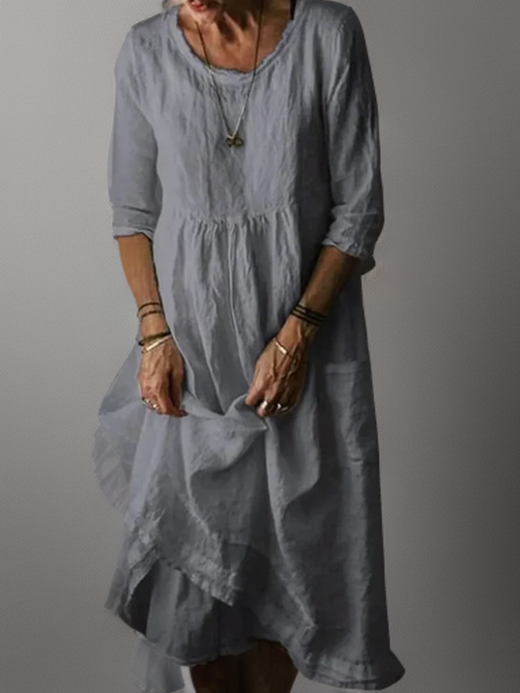 Dames zomerjurk met ronde hals, midi-lengte, tijdloos design, ideaal voor zomerse gelegenheden.