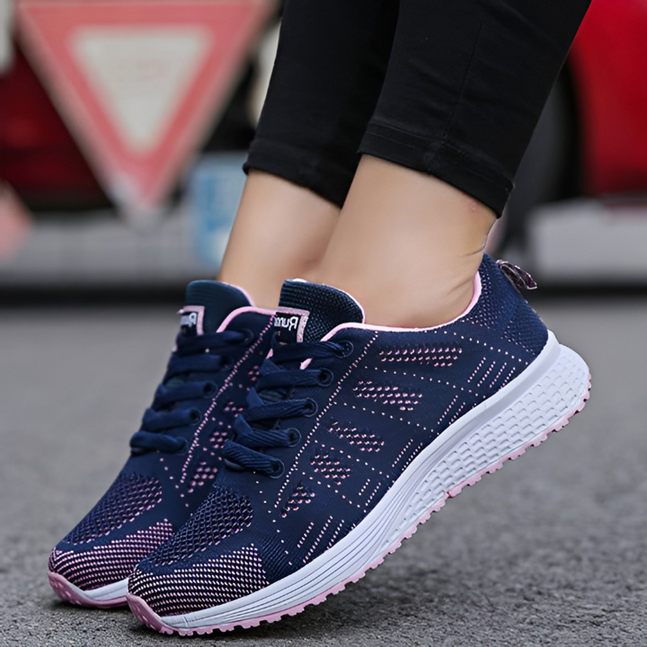 Lichte orthopedische sportschoenen voor dames, ideaal voor sport en vrije tijd, in wit met stijlvol design en optimaal comfort.