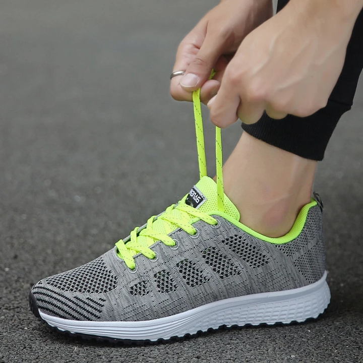 Lichte orthopedische sportschoenen voor dames, ideaal voor sport en vrije tijd, in wit met stijlvol design en optimaal comfort.