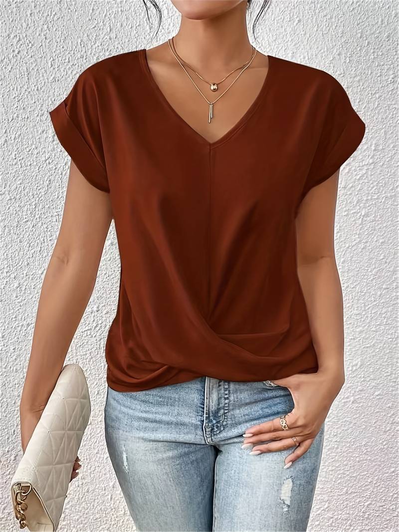 Lichtgewicht damesshirt met V-hals en gedraaide detail, comfortabele pasvorm, perfect voor diverse gelegenheden.