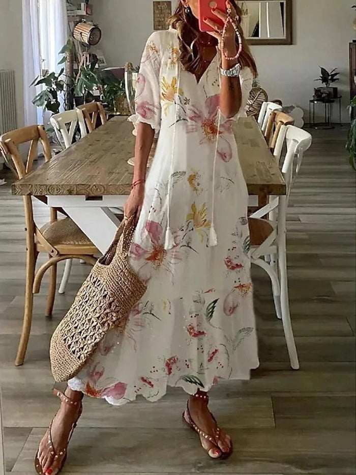 Lichtgewicht dames zomer midi jurk in diverse kleuren zoals beige, bont en lichtblauw