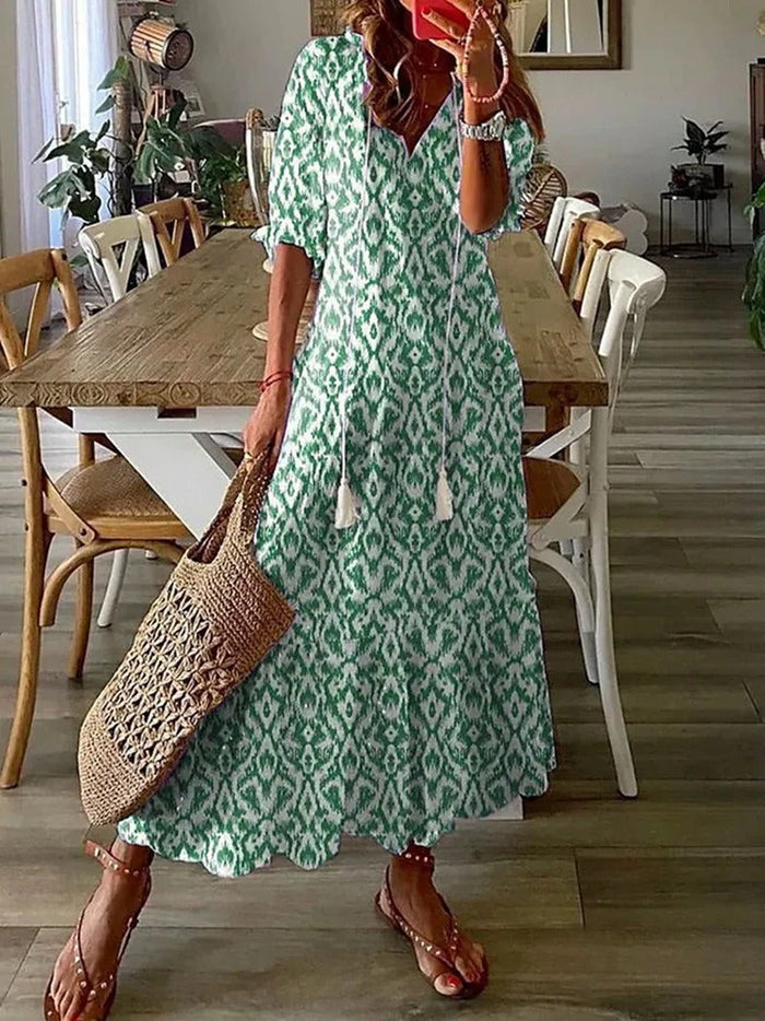 Vrouwen midi jurk met comfortabele pasvorm en fris kleurenpalet voor de zomer