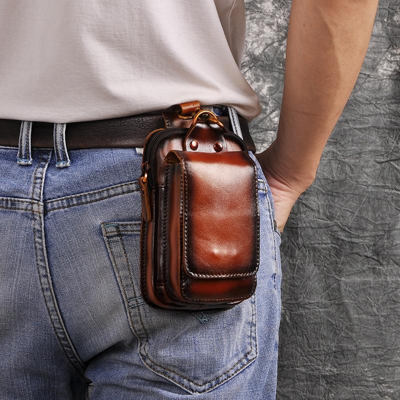 Zwarte leren heren heuptas LeatherGuard Pro, comfortabel om de taille gedragen, stijlvol accessoire.