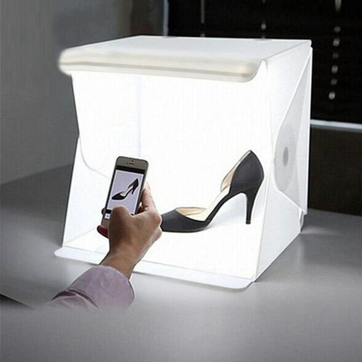 Lichtbox voor fotostudio, ideaal voor productfotografie, compact formaat, gelijkmatige verlichting, witte achtergrond.