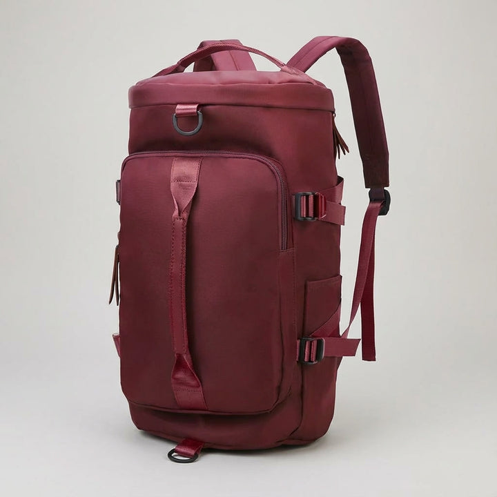 Compacte Voyagrin reistas van de zijkant. Slank ontwerp, perfect als handbagage of duurzame reisgenoot.