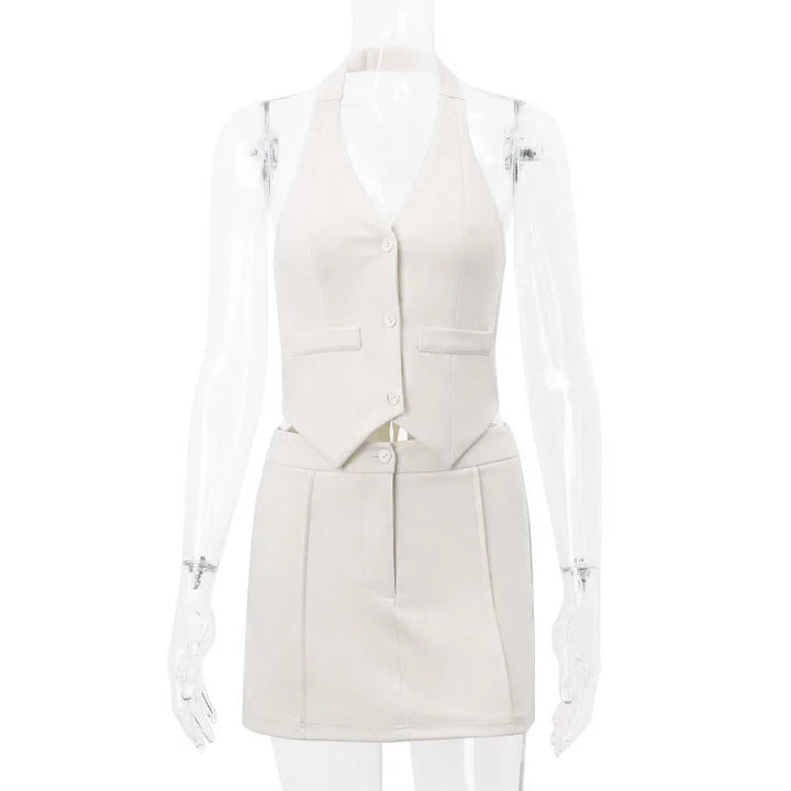 Vrouwenmode: Nayeli luchtig kantoor setje in abrikoos. Comfortabel tweedelig zomerkleding voor een stijlvolle zakelijke uitstraling.