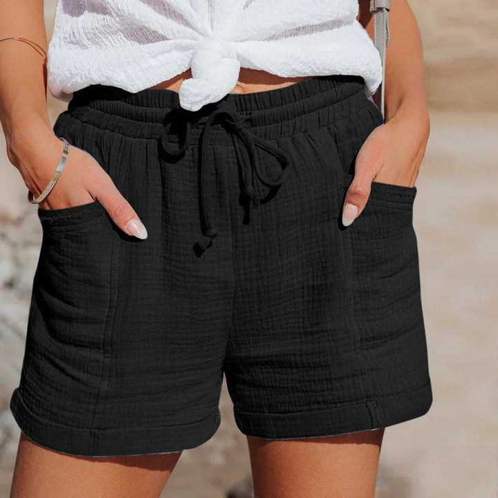 Luchtige effen dames shorts met elastische taille, comfortabel voor vrijetijd, thuis of als strandkleding.