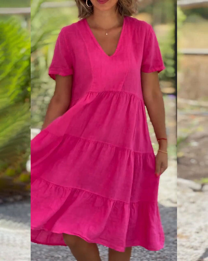 Lucy Zomerjurk, Boho-Chic, V-hals, korte mouw, A-lijn, lichte stof, ideaal voor zomerfeestjes en strandbezoeken. Elegante damesjurk.