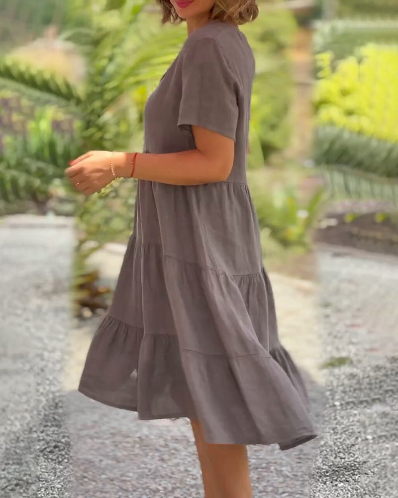 Lucy Zomerjurk, Boho-Chic, V-hals, korte mouw, A-lijn, lichte stof, ideaal voor zomerfeestjes en strandbezoeken. Elegante damesjurk.