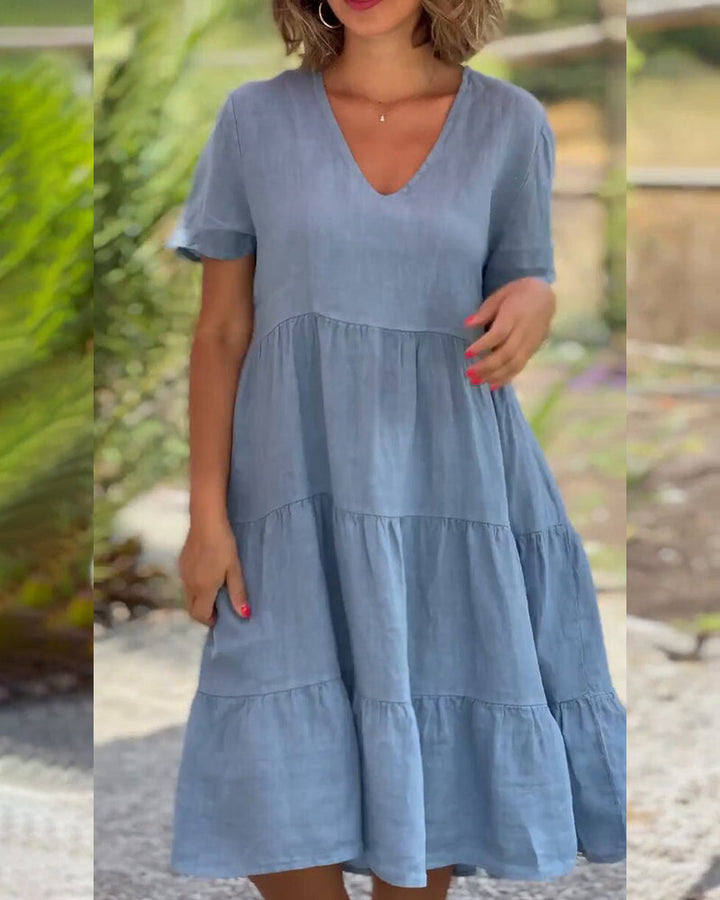 Lucy Zomerjurk, Boho-Chic, V-hals, korte mouw, A-lijn, lichte stof, ideaal voor zomerfeestjes en strandbezoeken. Elegante damesjurk.