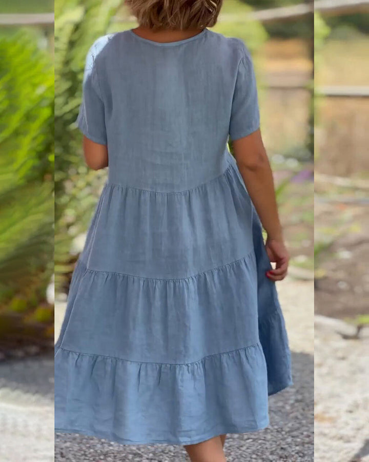Lucy Zomerjurk, Boho-Chic, V-hals, korte mouw, A-lijn, lichte stof, ideaal voor zomerfeestjes en strandbezoeken. Elegante damesjurk.