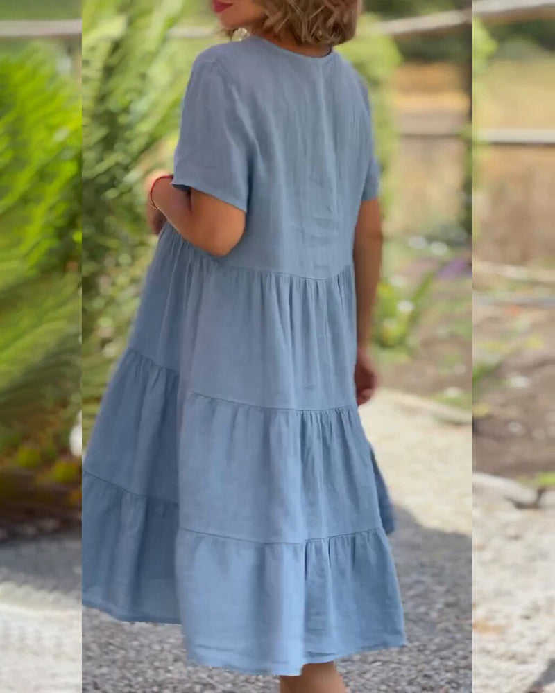 Lucy Zomerjurk, Boho-Chic, V-hals, korte mouw, A-lijn, lichte stof, ideaal voor zomerfeestjes en strandbezoeken. Elegante damesjurk.