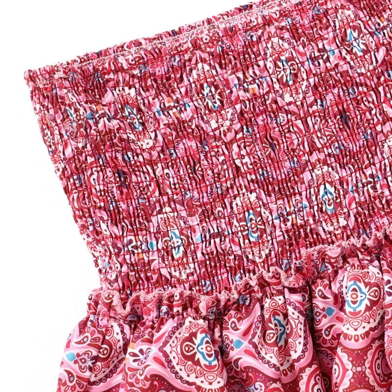 Luchtige, roze dames zomerrok met bloemenprint, ideaal voor warme dagen. Elegante, ademende damesrok.