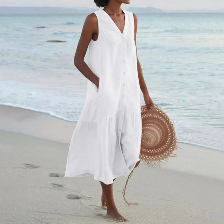Luchtige dames zomerjurk met knoopsluiting, midi-lengte, elegant ontwerp, perfect voor warme dagen en veelzijdige gelegenheden.