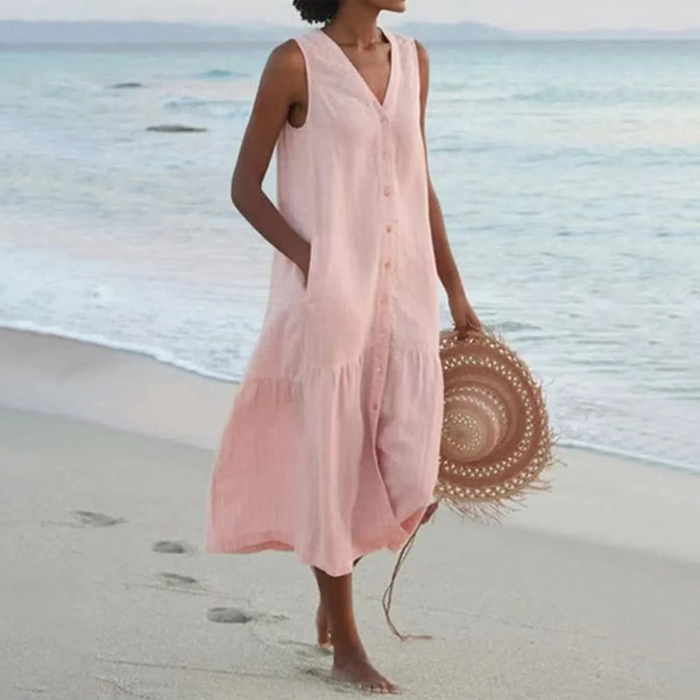 Luchtige dames zomerjurk met knoopsluiting, midi-lengte, elegant ontwerp, perfect voor warme dagen en veelzijdige gelegenheden.
