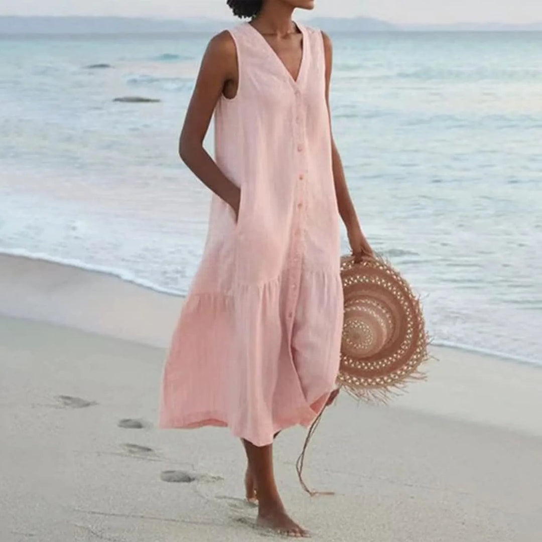 Luchtige dames zomerjurk met knoopsluiting, midi-lengte, elegant ontwerp, perfect voor warme dagen en veelzijdige gelegenheden.