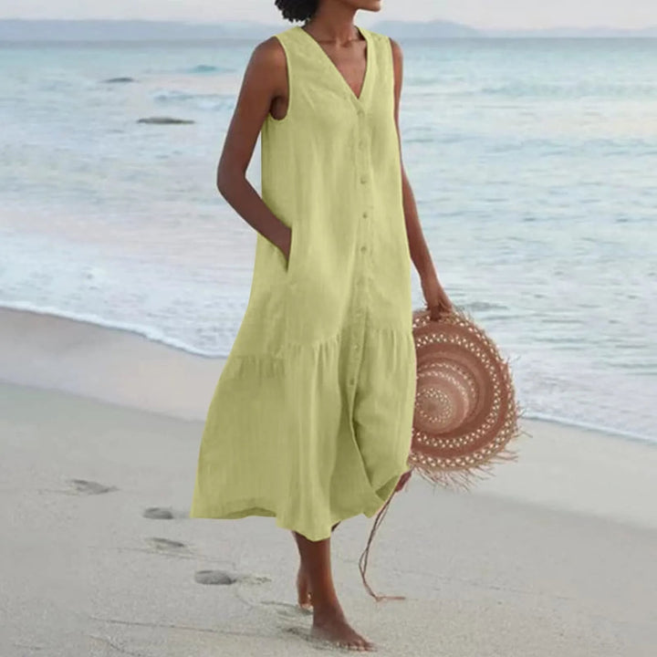 Luchtige dames zomerjurk met knoopsluiting, midi-lengte, elegant ontwerp, perfect voor warme dagen en veelzijdige gelegenheden.
