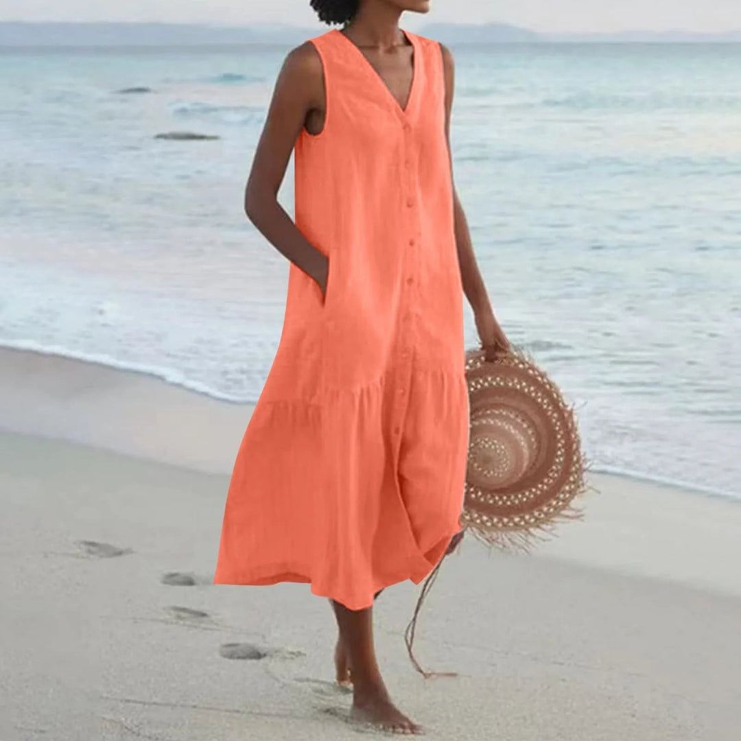 Luchtige dames zomerjurk met knoopsluiting, midi-lengte, elegant ontwerp, perfect voor warme dagen en veelzijdige gelegenheden.