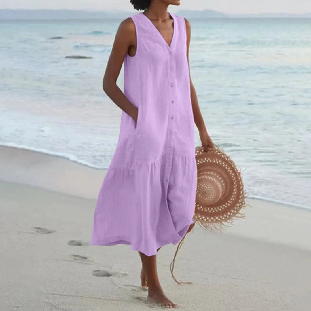 Luchtige dames zomerjurk met knoopsluiting, midi-lengte, elegant ontwerp, perfect voor warme dagen en veelzijdige gelegenheden.