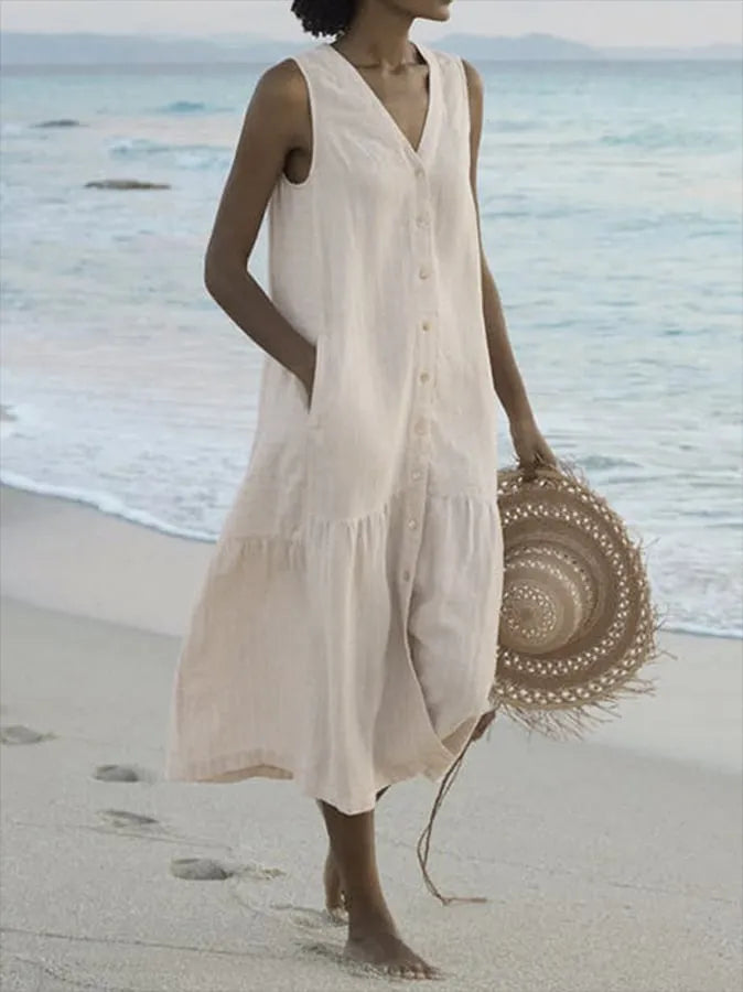 Luchtige dames zomerjurk met knoopsluiting, midi-lengte, elegant ontwerp, perfect voor warme dagen en veelzijdige gelegenheden.