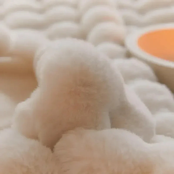 Perfecte zachte pluche deken van WarmWol als cadeau; een warm en gezellig accessoire.