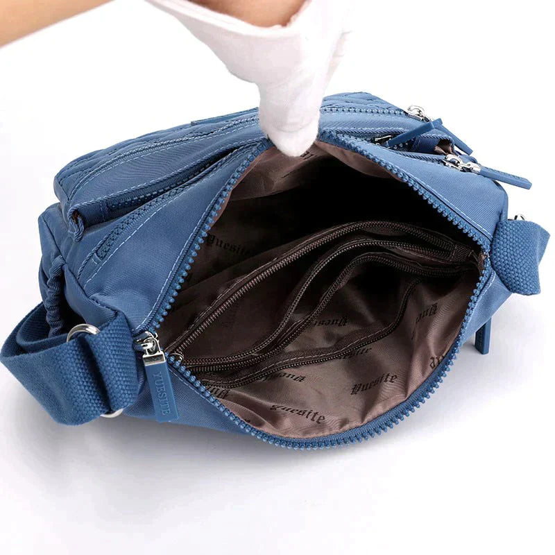 Luxe dames schoudertas in zwart met verstelbare riem, meerdere vakken, ideaal voor dagelijks gebruik en speciale gelegenheden.