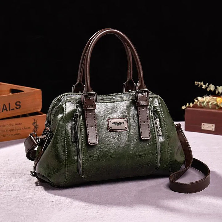 Luxe dames leren handtas met elegante textuur, praktisch en ruim verkrijgbaar in bruin, groen, rood of zwart voor een veelzijdige stijl