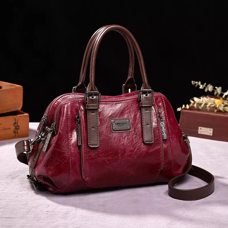 Luxe dames leren handtas met elegante textuur, praktisch en ruim verkrijgbaar in bruin, groen, rood of zwart voor een veelzijdige stijl