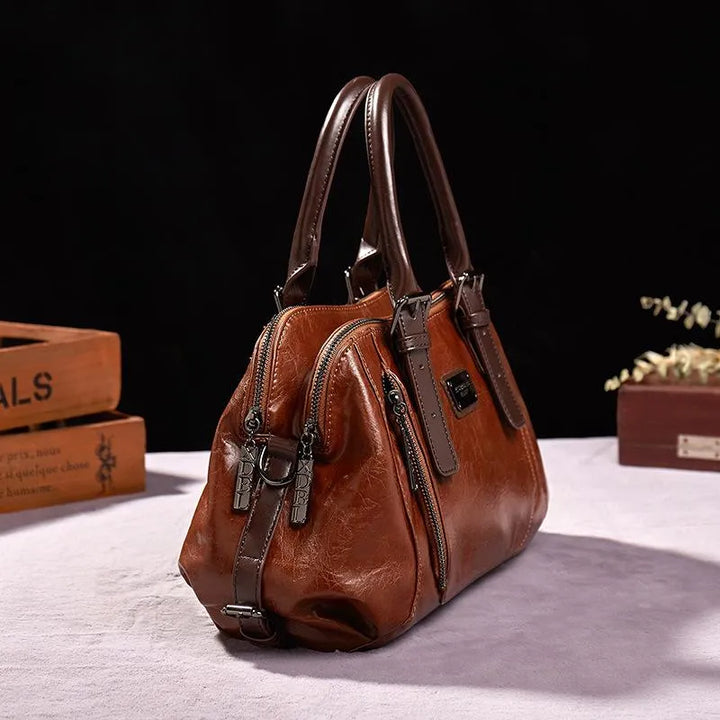 Luxe dames leren handtas met elegante textuur, praktisch en ruim verkrijgbaar in bruin, groen, rood of zwart voor een veelzijdige stijl