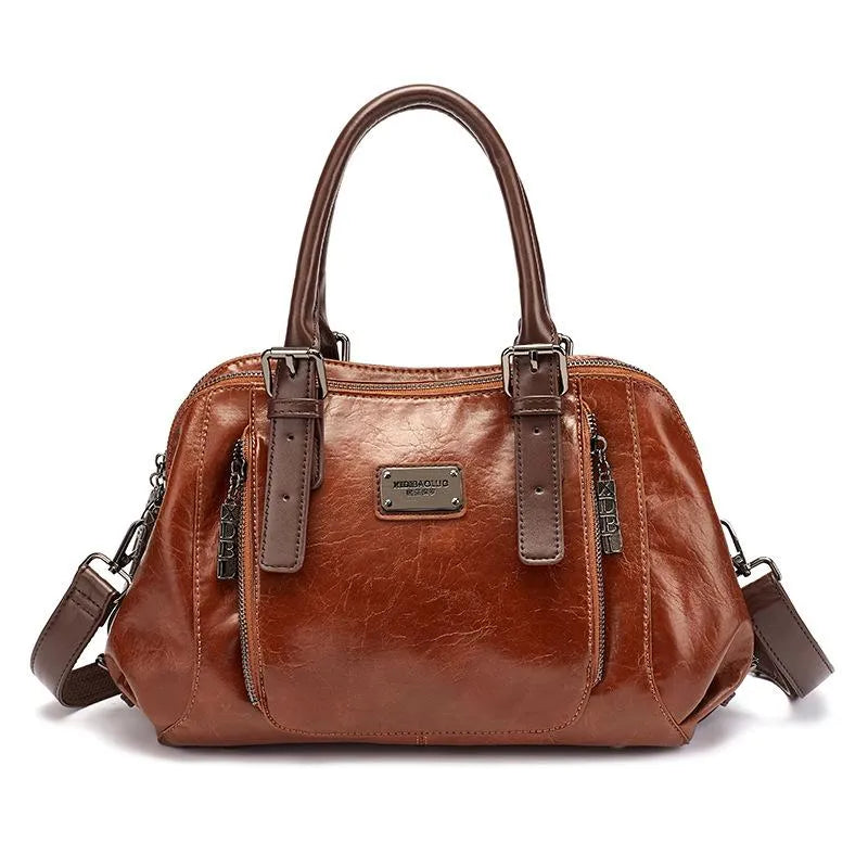 Luxe dames leren handtas met elegante textuur, praktisch en ruim verkrijgbaar in bruin, groen, rood of zwart voor een veelzijdige stijl