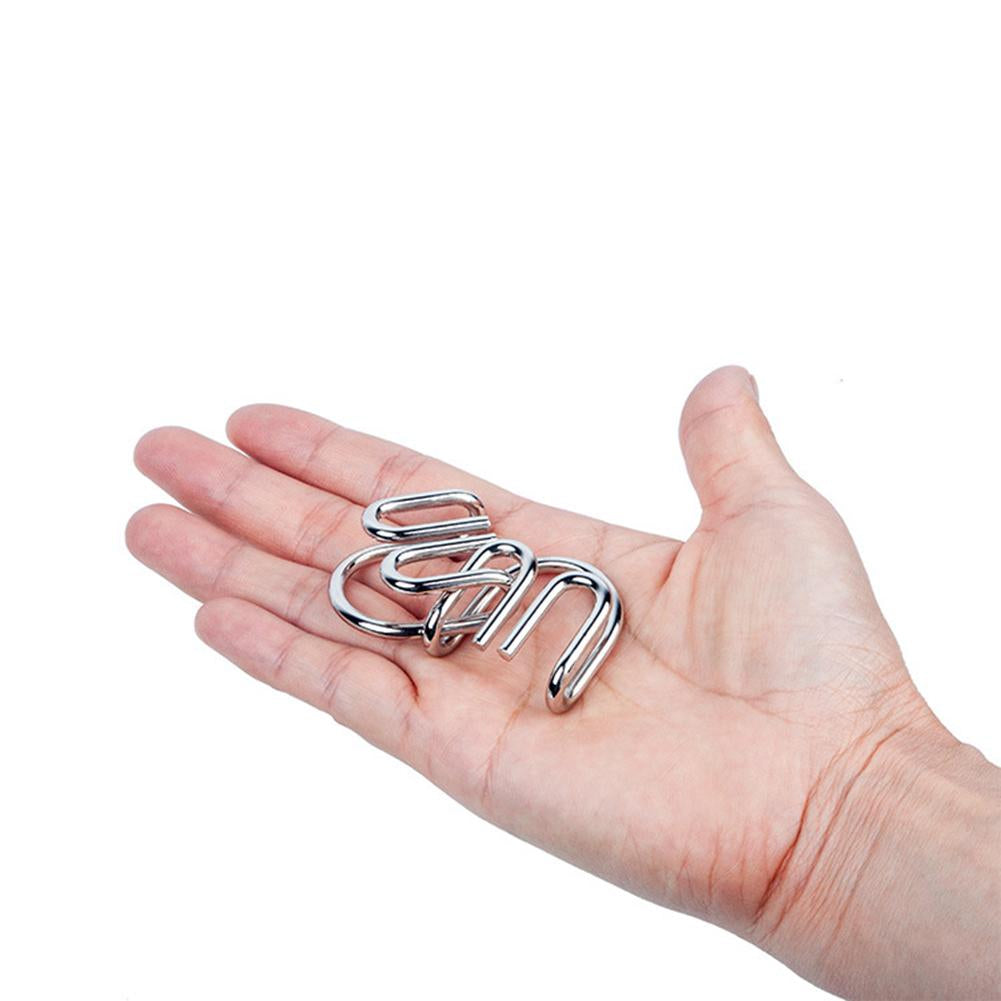 Metalen puzzelringen met in elkaar grijpende vormen, ideaal voor logica en vaardigheidstraining