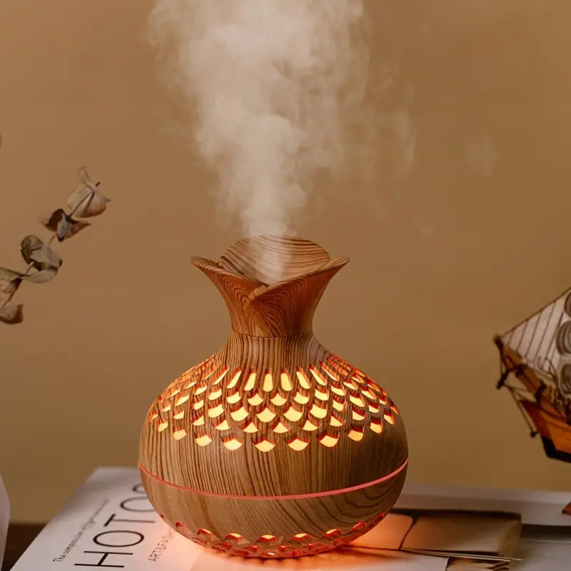 Moderne AromaBloom diffuser met sfeerverlichting voor ontspanning en interieur. Perfect voor aromatherapie.