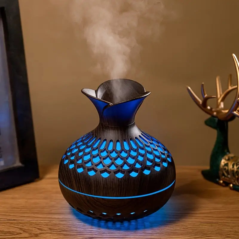 Stijlvolle AromaBloom luchtbevochtiger met LED sfeerverlichting; ideaal voor rustgevende aromatherapie thuis.