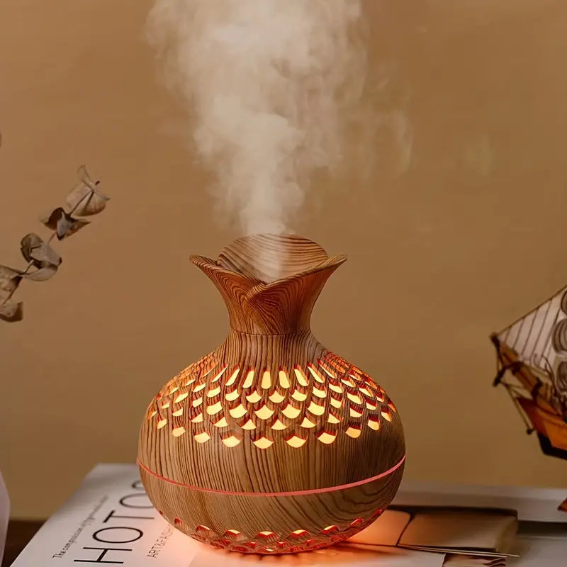 Compacte AromaBloom aroma diffuser, luchtbevochtiger & sfeerverlichting voor rust, welzijn en interieur.