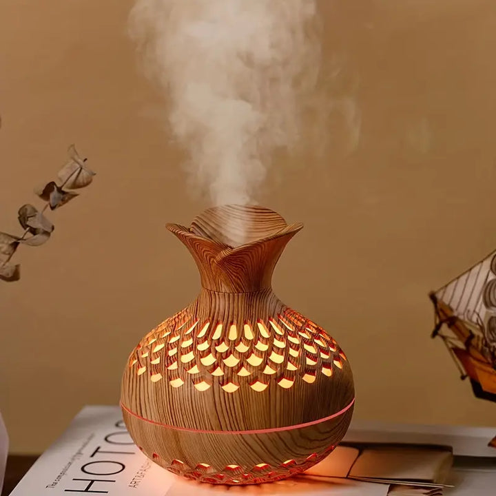 Compacte AromaBloom aroma diffuser, luchtbevochtiger & sfeerverlichting voor rust, welzijn en interieur.