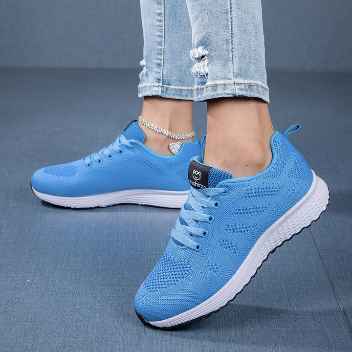 Witte dames sneaker, zijkant