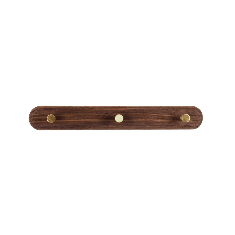 Elegante houten wandkapstok met glanzende messing haken. Verbetert uw interieur en biedt praktische opbergruimte.