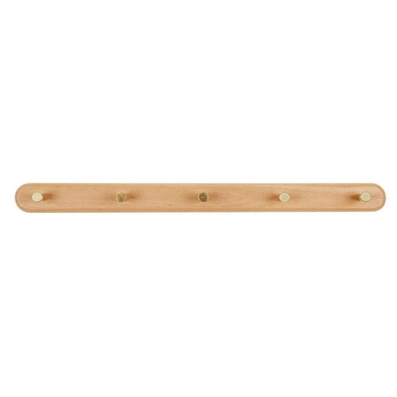 Natuurlijke houten wandkapstok met robuuste messing haken. Voegt organisatie en een modern tintje toe aan elke kamer.