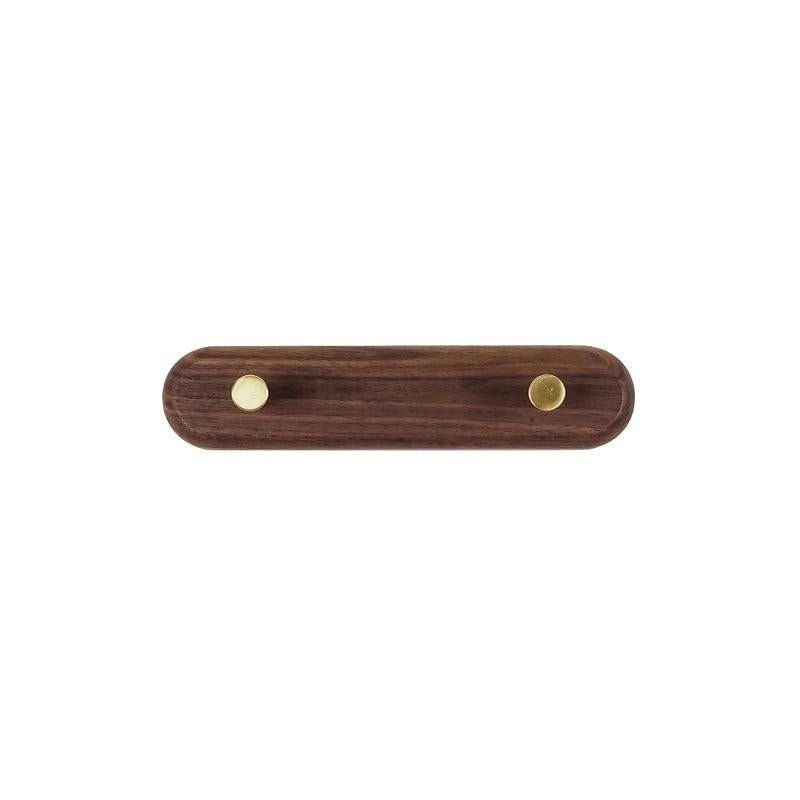 LignaHook minimalistische wandkapstok van hout met messing haken. Ideaal voor een opgeruimde slaapkamer of hal.