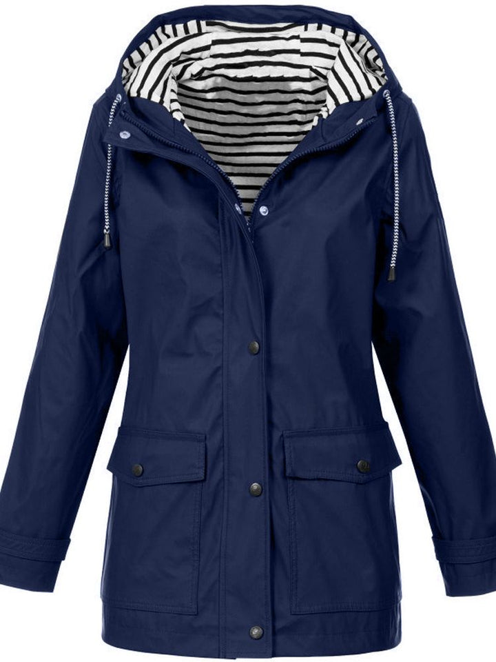 Roze damesjas, eigentijds design, beschermt tegen wind en regen, comfortabel en modieus.