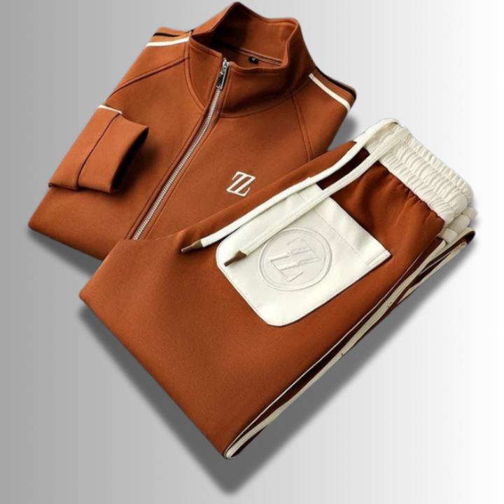 Modern heren joggingpak, ademend, in het grijs met capuchon en zakken, ideaal voor sport en vrije tijd.