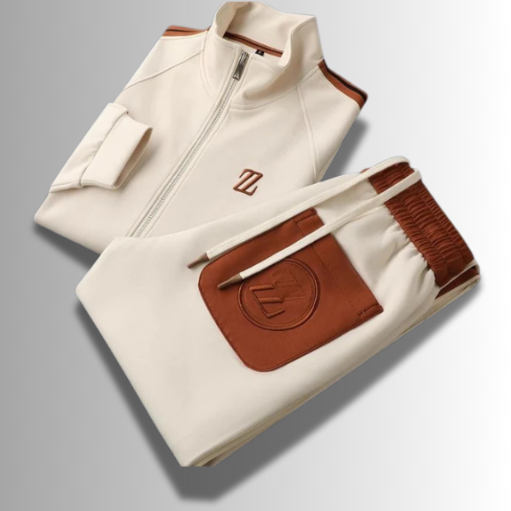 Modern heren joggingpak, ademend, in het grijs met capuchon en zakken, ideaal voor sport en vrije tijd.